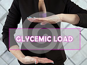 GLYCEMIC LOAD text in futuristic screen.  TheÂ glycemic load of food is a number that estimates how much the food will raise a